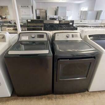 Gray GE Top Load Washer Without an Agitator Electric Dryer Set
