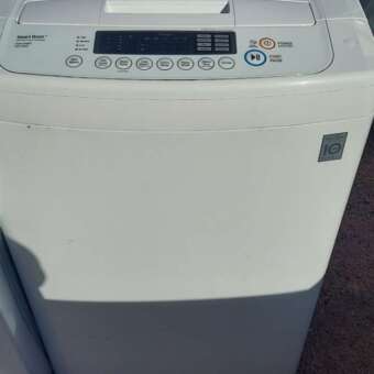 Compact 24.5" LG Top Load Washer Without An Agitator- 3.6 cu ft