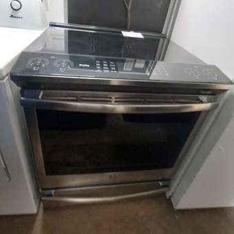 30" Stainless Steel GE Profile Electric Glasstop Slide In Range W/ Convection and Warming Zone
